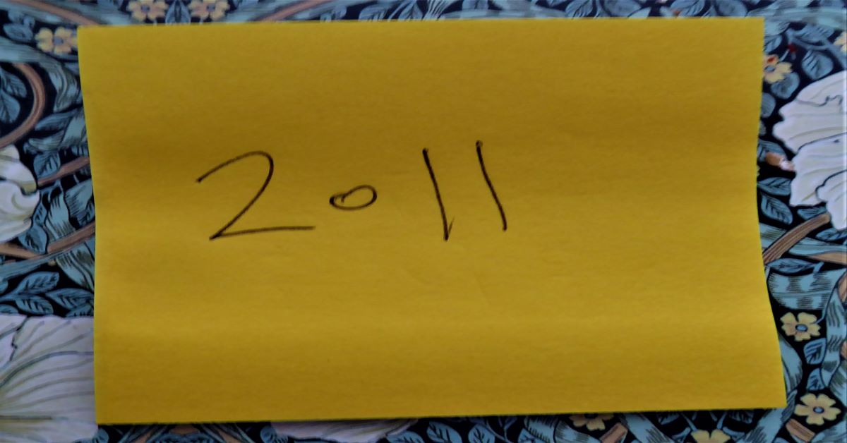 2011 doodled on a post-it note