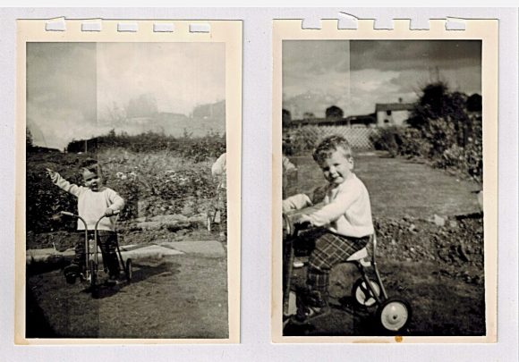Depiction of post author as a child Two black and white photograph scans. 1.Mark pointing to the countryside 2. Mark with first haunted house in the background.